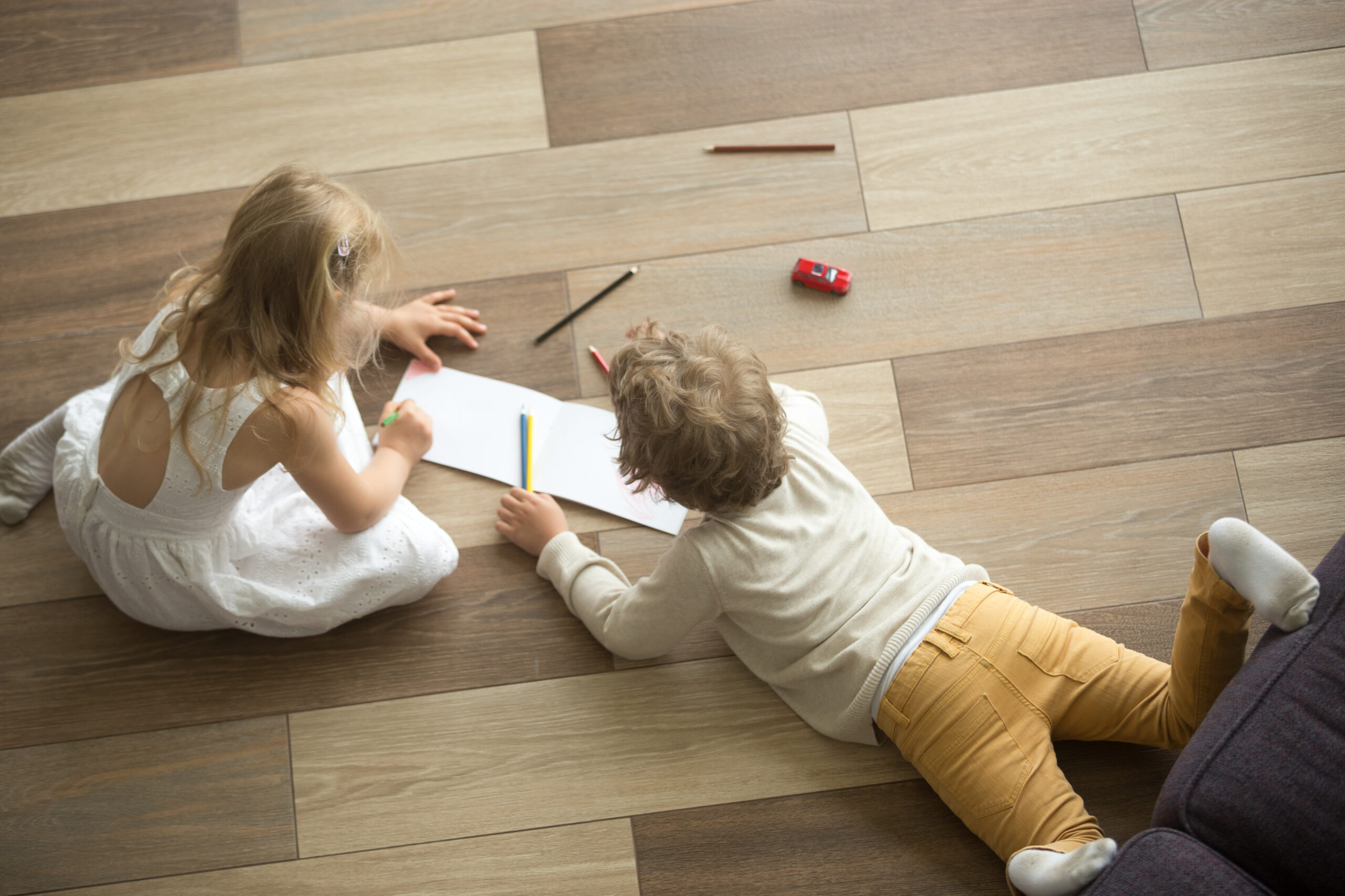 kids playing on hardwood floor